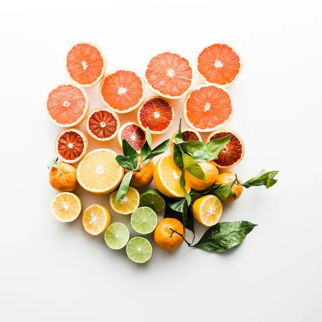 Halved oranges, lemons and limes packed edge to edge
