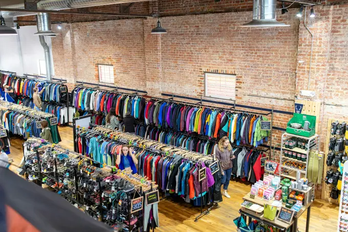 The inside of a small outdoor shop, kit on rails
