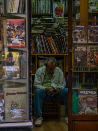 Someone sitting on the shop floor part-way through an issue