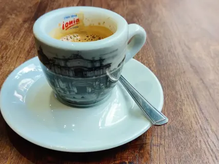 An espresso on the bar, no ceremony