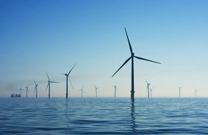 Offshore wind turbines standing in open water