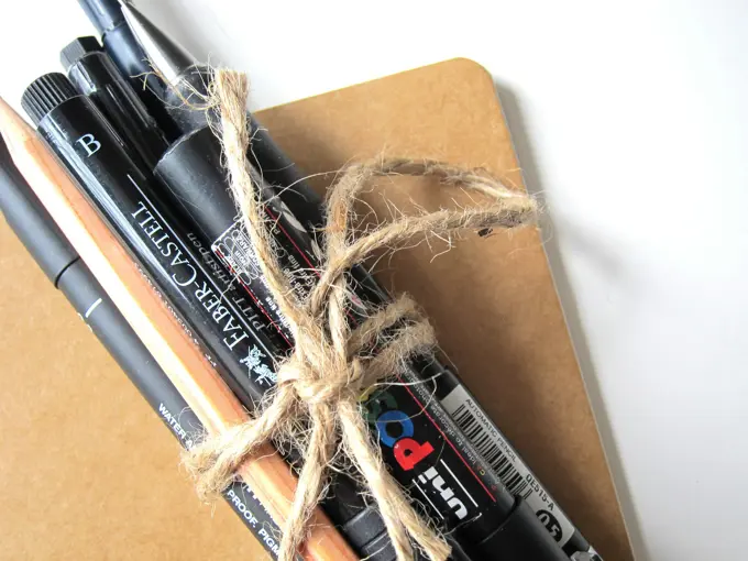 Brush pens, technical pens and pencils gathered together